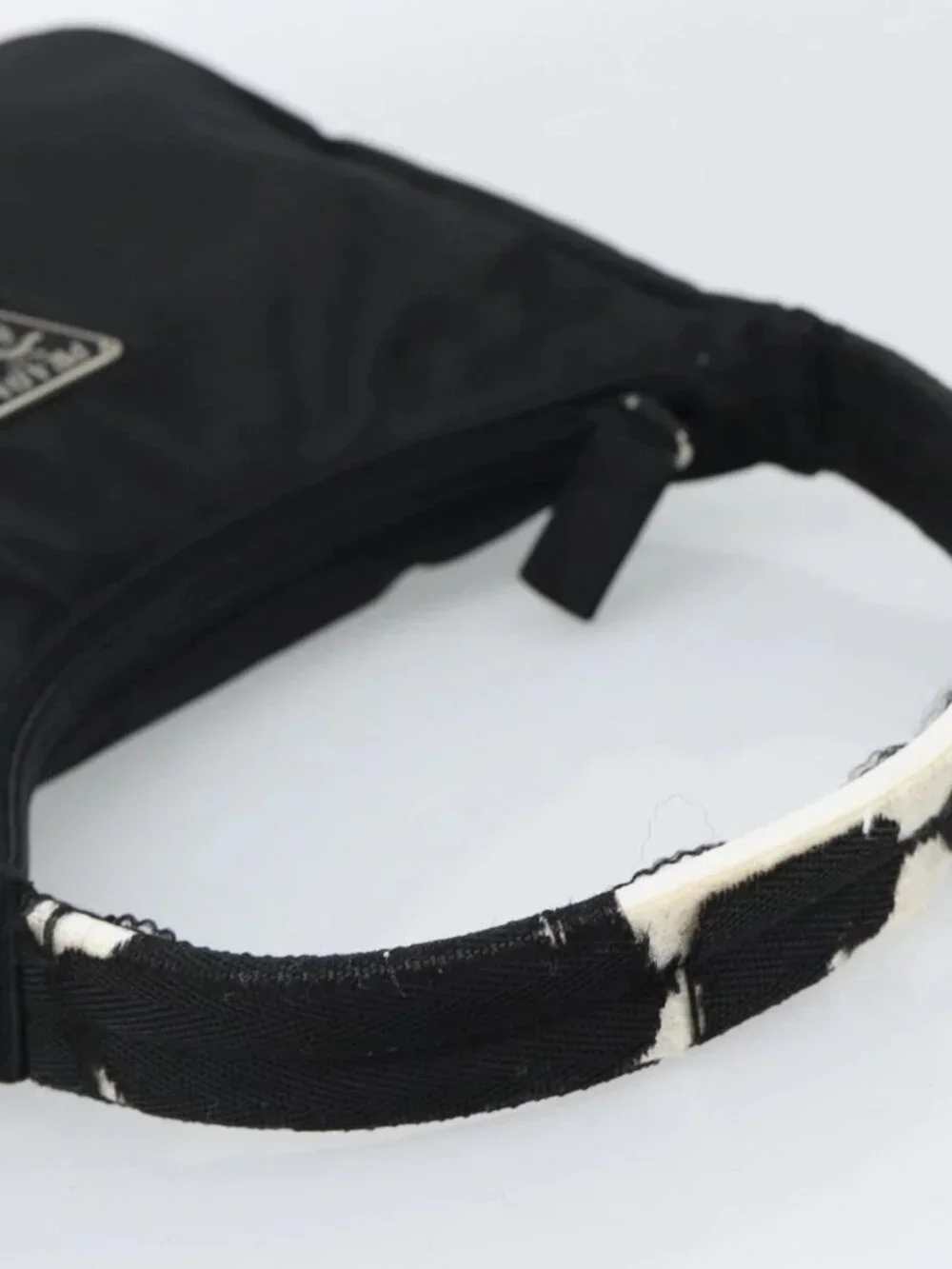 Prada brand	prada color	black